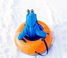 Snow tubing is a favorite winter activity in Chicago. Photo courtesy of Canva