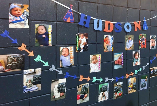 Show all the party attendees snaps from the whole first year of your baby's life.