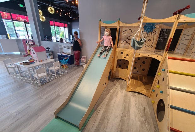 Wheee! Slide, play, and eat at My Little Paris.