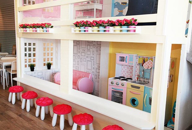 a dollhouse and play space at a Latte Fun Play Spaces on Long Island Open Now