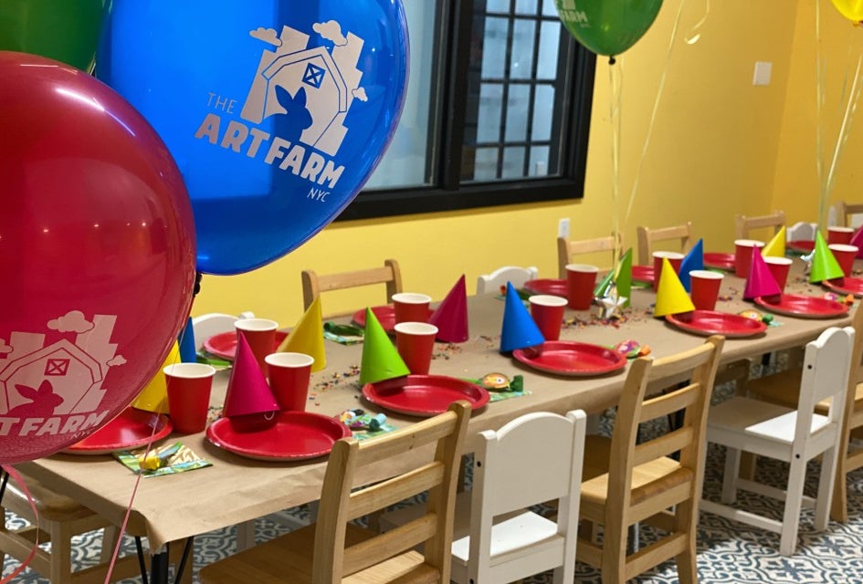 The Art Farm offers a delightful backdrop for a first birthday celebration—live animals included. Photo courtesy of the venue