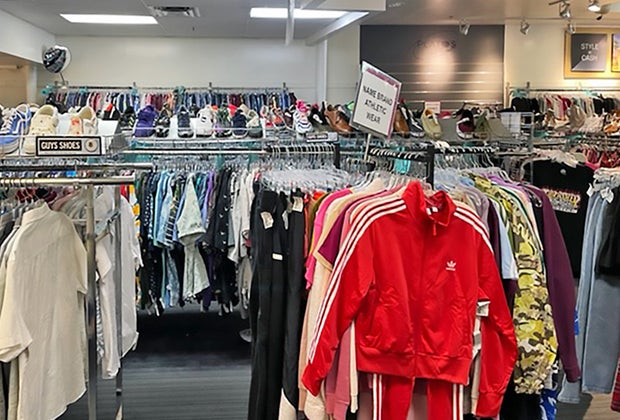 wide shot of thrift store second-hand clothes