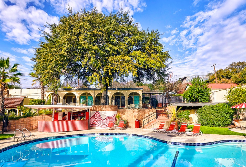 The retro kidney-shaped pool at the Austin Motel on the south side of the river. Photo courtesy of Visit Austin.