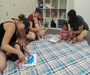 Tots and their parents can get creative in parent-and-me art classes at Waddle N Swaddle. Photo courtesy of Waddle N Swaddle