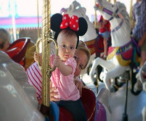 Have a memorable day at the most magical place on earth with a baby. Photo by Eduardo Merille/CC BY 2.0