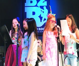 At a Bach to Rock birthday party, kids can sing karaoke or record their own CD. 