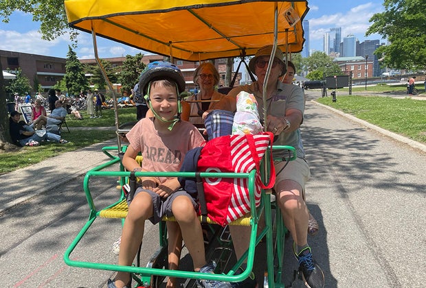 Things to do in NYC this summer: Families ride a surrey on Governors Island