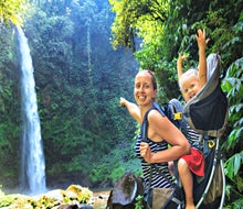 Wander to a local waterfall, with excited kids in tow.