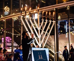 Get festive this New Year's Weekend at the Annual Menorah Lighting in the Seaport District event photo courtesy of @seaportbos on Instagram