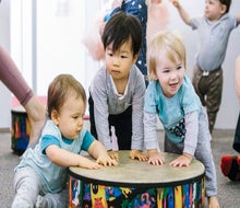Little music makers learn and play together and with their grown-ups. Photo courtesy of Ladybug Music