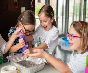 Collaborative problem solving is a hallmark of Camp Invention. Photo courtesy of Camp Invention