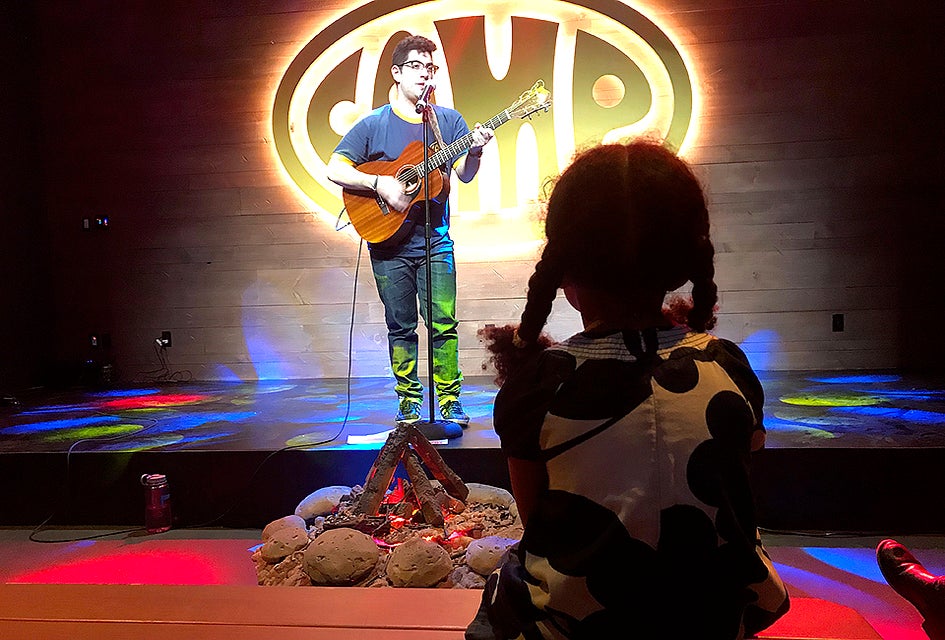 Sing songs around the campfire at the new Camp store in Downtown Brooklyn. Photo by Jody Mercier