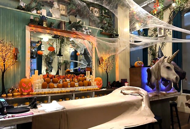 The Cauldron pumpkin patch: Halloween decorations and pumpkins line the bar