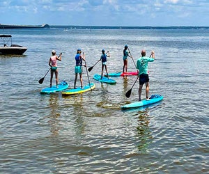 Paddleboarding  is just one of many fun water activities in Destin. Photo by Jennifer Swope