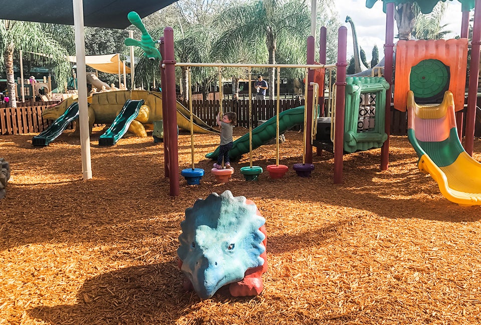 Toddlers and young kids can let loose with their prehistoric friends at Dinosaur World's cute playground. Photo by Charlotte Blanton