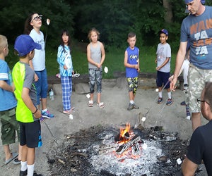 Pack up the family for a fun night of camping at Knoch Knolls Park. Photo courtesy of  Naperville Parks