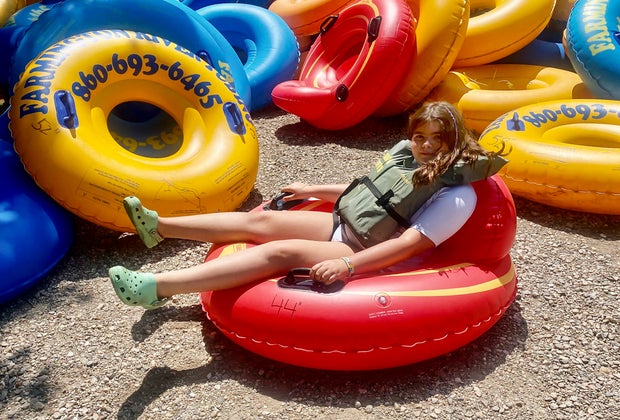 Photo of child in a tube - Farmington River Tubing