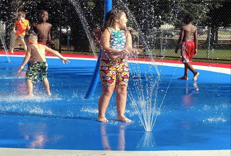 A recently renovated spray deck abuts a beloved free pool in Somerville's Foss Park. Photo courtesy of  Willene Ticianeli