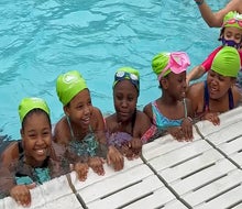 Kids can learn to swim for free through the NYC Parks Department. Photo by Jody Mercier