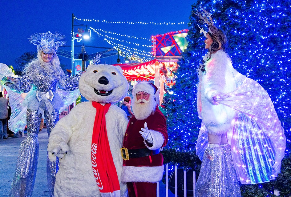 The costumed characters wandering the park are happy to pose for festive photo-ops at Luna Park's Frost Fest. Photo courtesy of Luna Park in Coney Island 