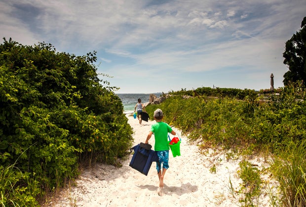 Photo of child on beach path - Best Summer Day Trips from Boston.