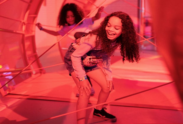 little girl going through the twizzler maze at the Hershey Super Sweet Adventure