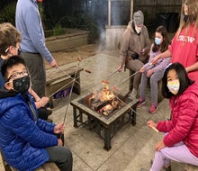 Roasting hot dogs for dinner at Nature Discovery Center's Campfire Night. Photo by author 