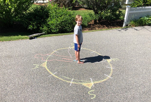 a picture of a human sun dial, fun summer science for kids