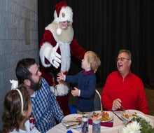 Santa's ready for all the hugs around the dinner tables at the Brookfield Zoo Chicago. Photo courtesy of the zoo