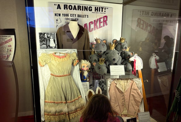 New York City Ballet's Family Saturdays: Toddler looking at the displays in the lobby