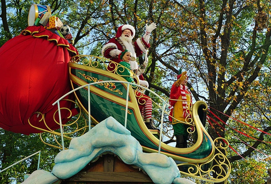 Santa rolls into town at the tail end of the Macy's Thanksgiving Day Parade and starts taking gift requests at Santaland on Friday. Photo by Jody Mercier