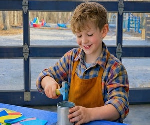 CMEE hosts a Tin Smithing workshop with Suffolk County Farms, where kids can enjoy old fashioned fun. Photo courtesy of CMEE