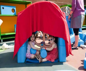 Play with sand, water, or the big blue blocks at the Imagination Playground. Photo courtesy NYC Parks