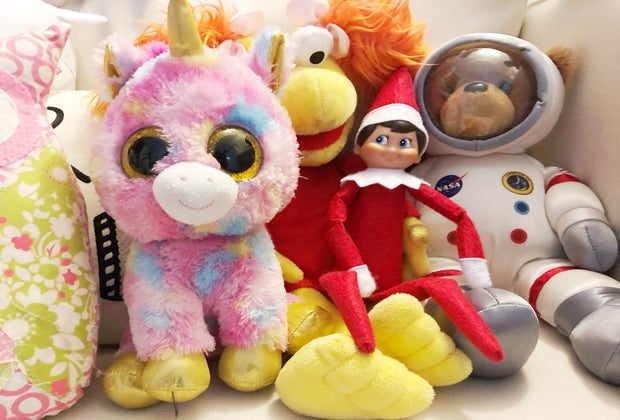 Elf on the Shelf hides among the stuffed animals