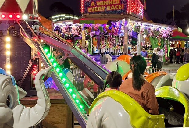 Rides for tiny tots are plentiful at the Polar Playground at Winter Fest OC.