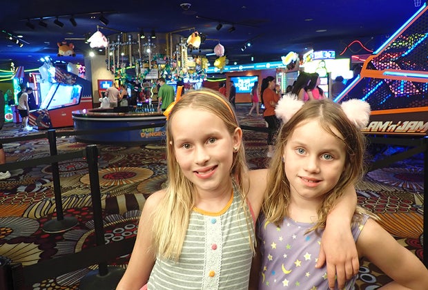 two girls at an arcade
