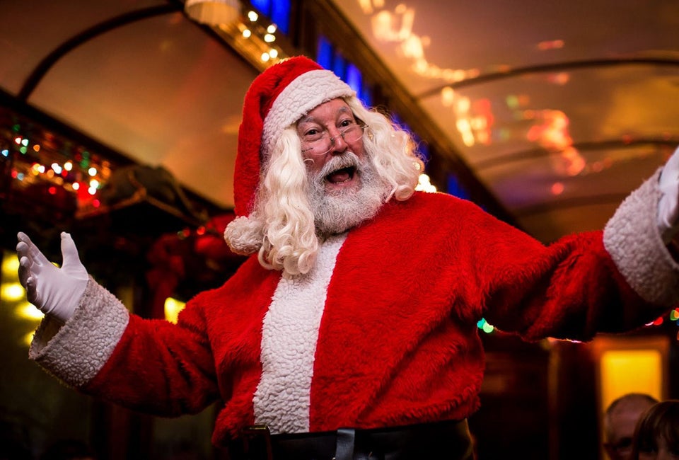 Santa greets families on the daytime Santa Express and the evening Northern Lights Limited Christmas trains. Photo courtesy of the Naugatuck Railroad