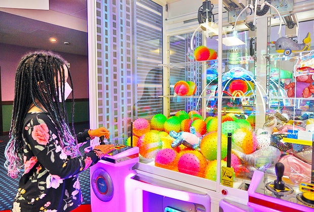 Legoland NY Hotel girl playing arcade games