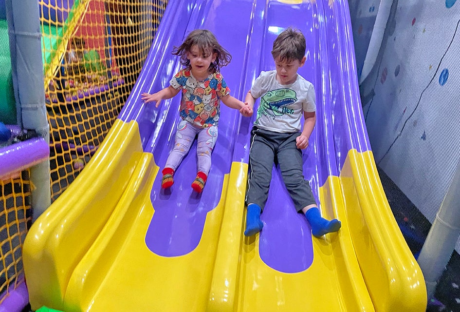 Speed down the slides at Bellmore's Planet Play. 