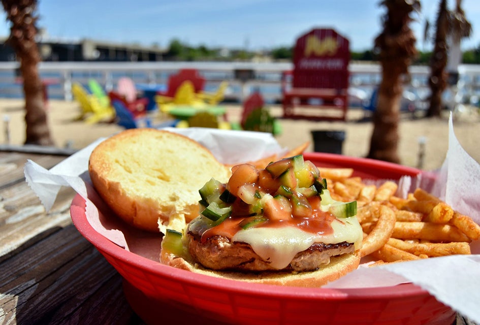 Enjoy the tropical island atmosphere at Pop's Seafood Shack and Grill in Island Park.