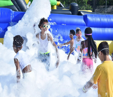 The world's first all-inflatable water park slides onto Long Island, with 25 giant inflatable water slides. Photo courtesy of Slide City