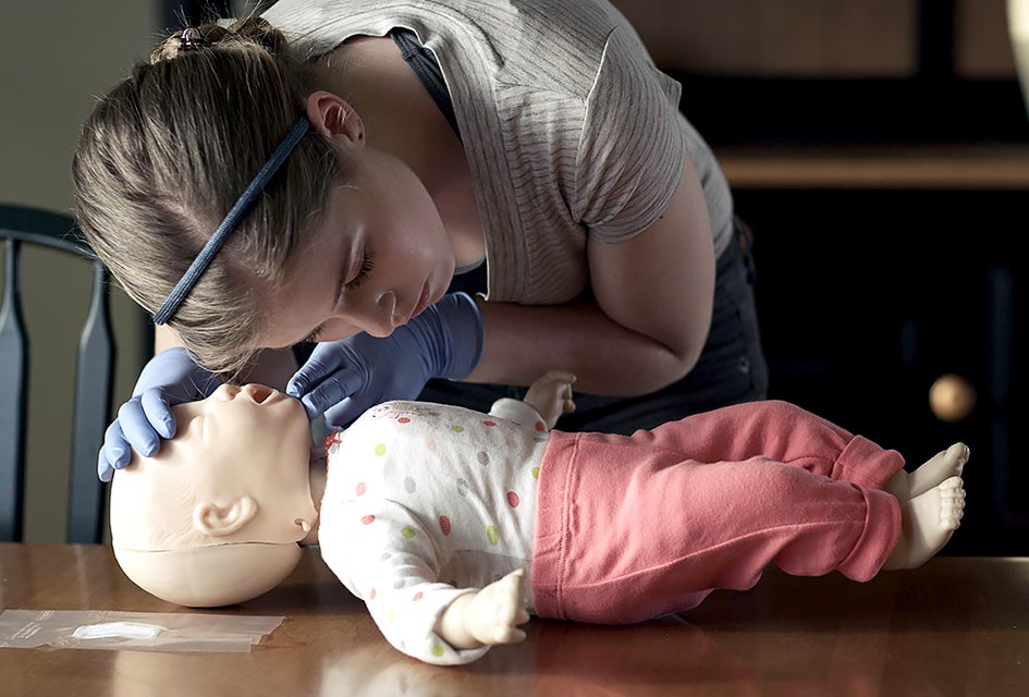 Students hone their babysitting skills at the American Red Cross babysitting class. Photo courtesy of American Red Cross; 
