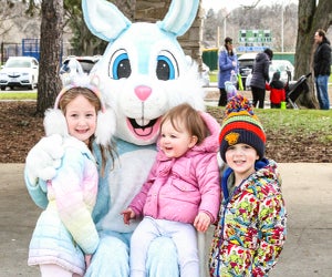 Stopping for an Easter Bunny picture at an egg hunt. Photo courtesy of the Lisle Easter Egg Hunt