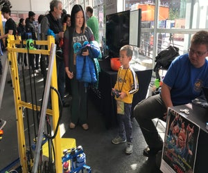 Little techies greet robots and their makers. Photo courtesy of MassRobotics