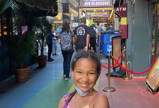 Things To Do in Midtown West with Kids: Girl in front of SIX on Broadway