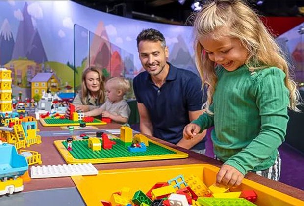 Image of family playing at LEGOLAND Discovery Center Boston.