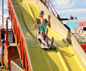 Slide into some fun at the Norwalk Oyster Festival. Photo by Richard Bonenfant