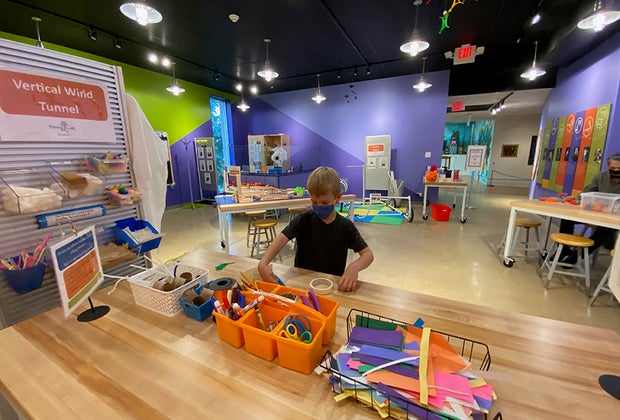 Boy at the Vertical Wind Tunnel Station at Spark!Lab at the Morris Museum