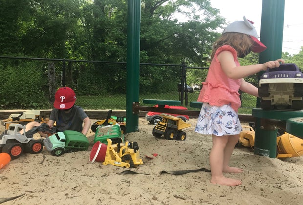 Children play in the sandbox at Mountwell Park