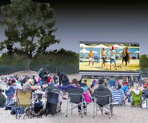 See a movie on the beach while warm evenings linger. Photo courtesy of Newport Dunes 